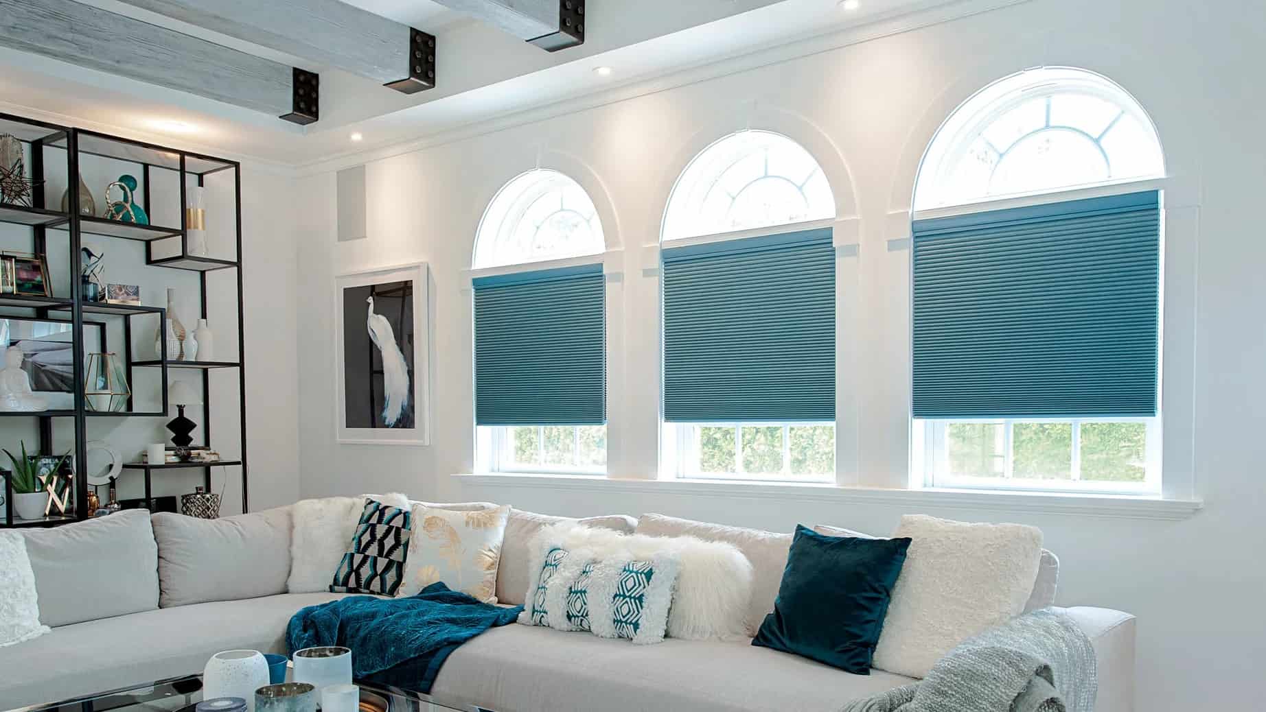 the art of layering cellular shades with curtains for a chic look